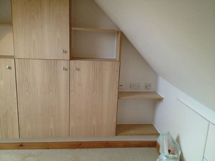 Bespoke made to measure oak cupboards and shelves.