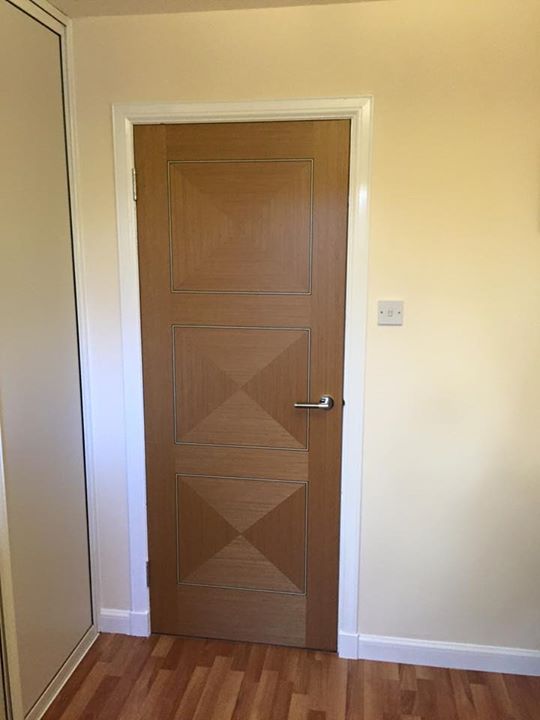 Oak 'Biarritz' doors with new skirtings and facings for Mr Anderson-Linlithgow