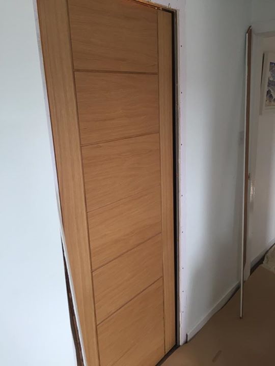 Oak 'Palermo' doors, standards, skirtings and facings. Solid oak stairparts