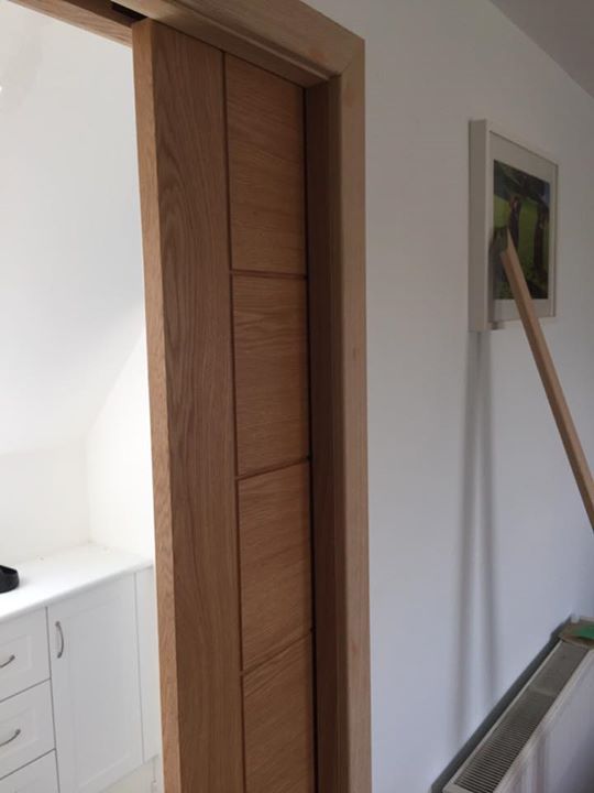 Oak 'Palermo' doors, standards, skirtings and facings. Solid oak stairparts