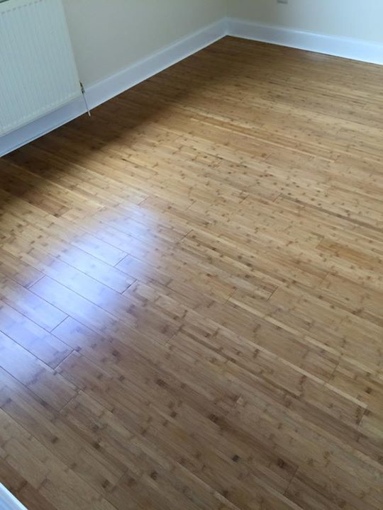 Solid bamboo flooring and new Cream Gloss Kitchen
