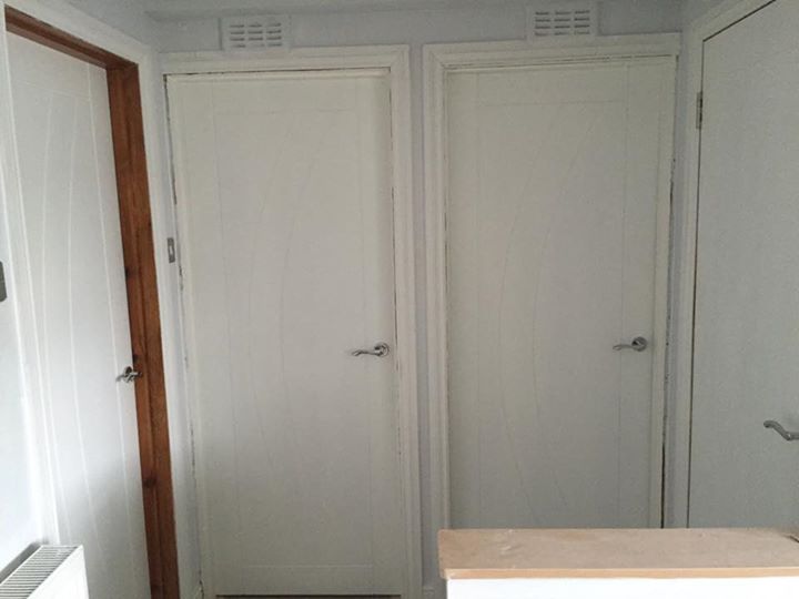 White 'Salerno' doors with new skirtings and facings