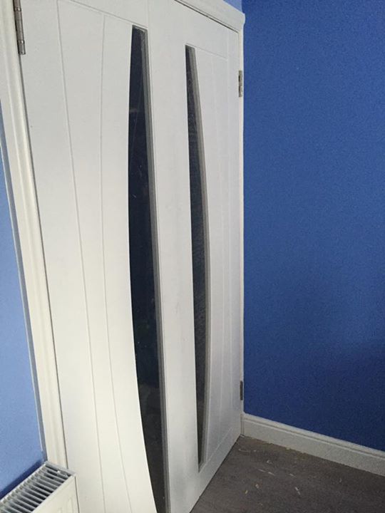 White 'Salerno' doors with new skirtings and facings